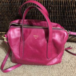 Genuine leather dark pink hobo bag.